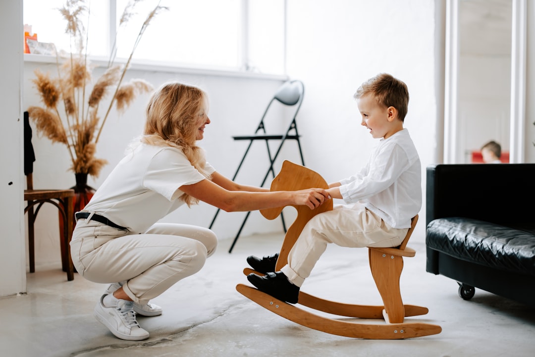 A young special-needs child working with a pediatric therapist during a therapy session