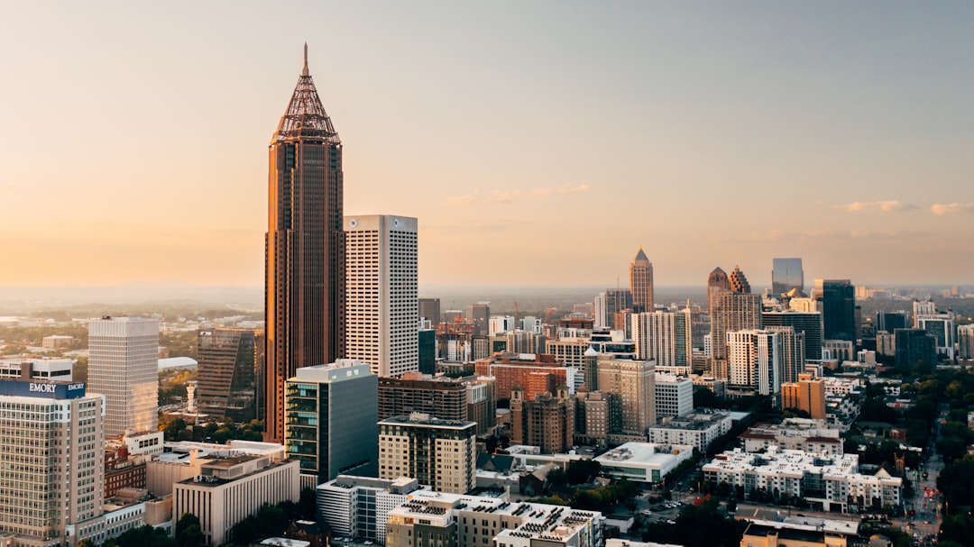 Crowds of World Cup fans gathered in downtown Atlanta with the city skyline behind them