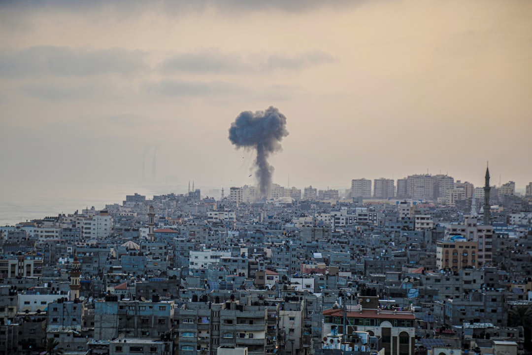 Palestinians inspect the rubble of buildings destroyed by Israeli airstrikes in Gaza