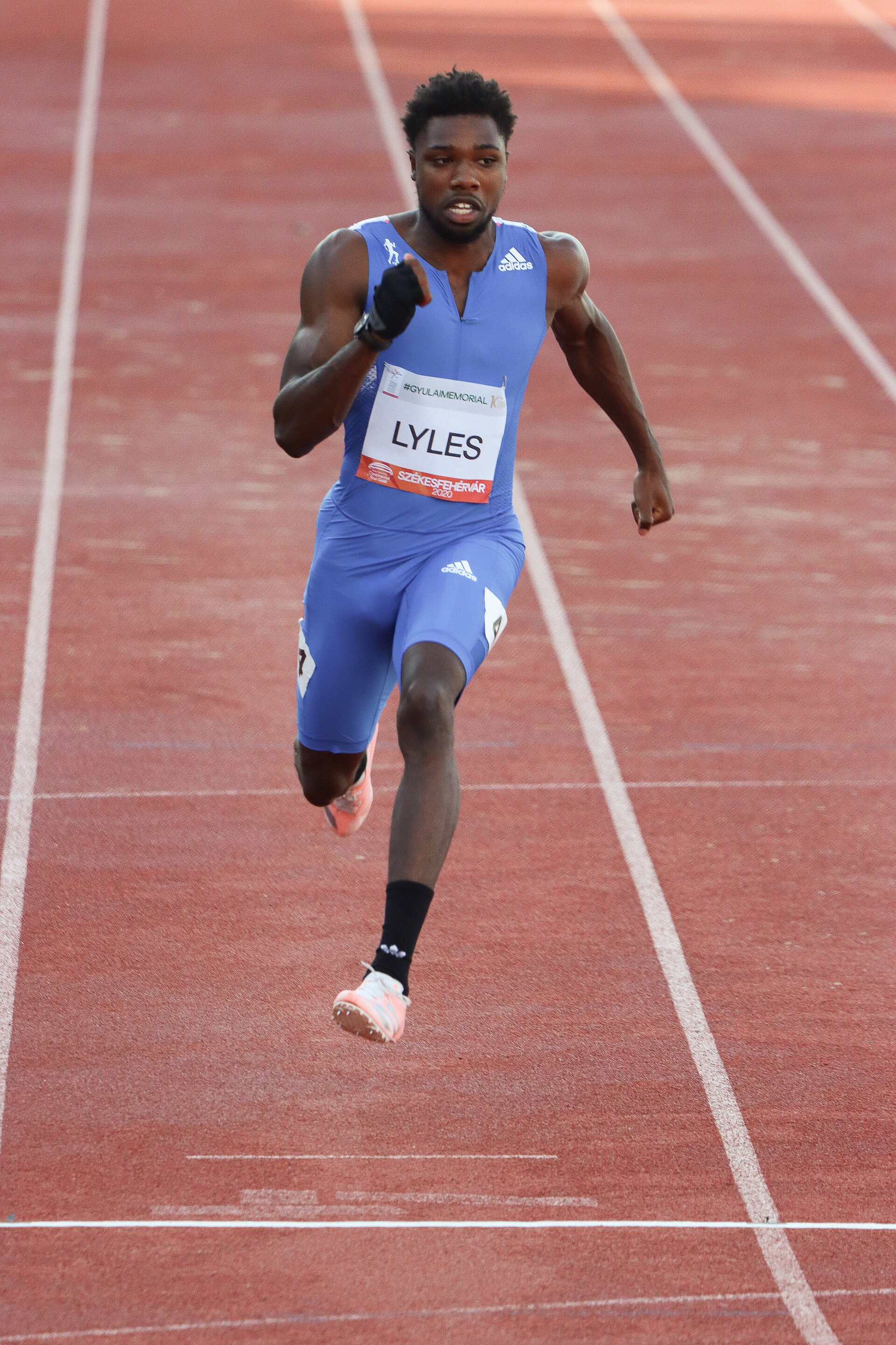 Sprinter Noah Lyles running in the 100m at a track and field championship