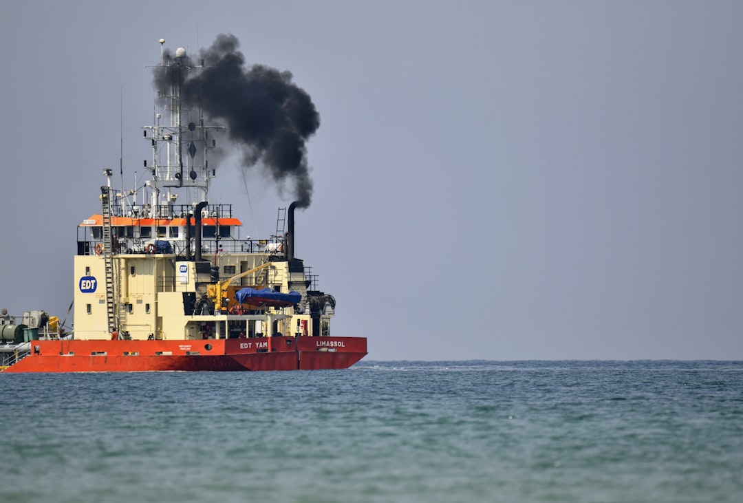 An oil tanker burns in the Persian Gulf after a U.S. military strike on Iranian vessels following an attack on American Navy warships.